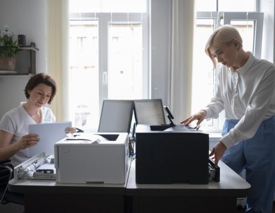 women-work-office-using-printer-min (1)